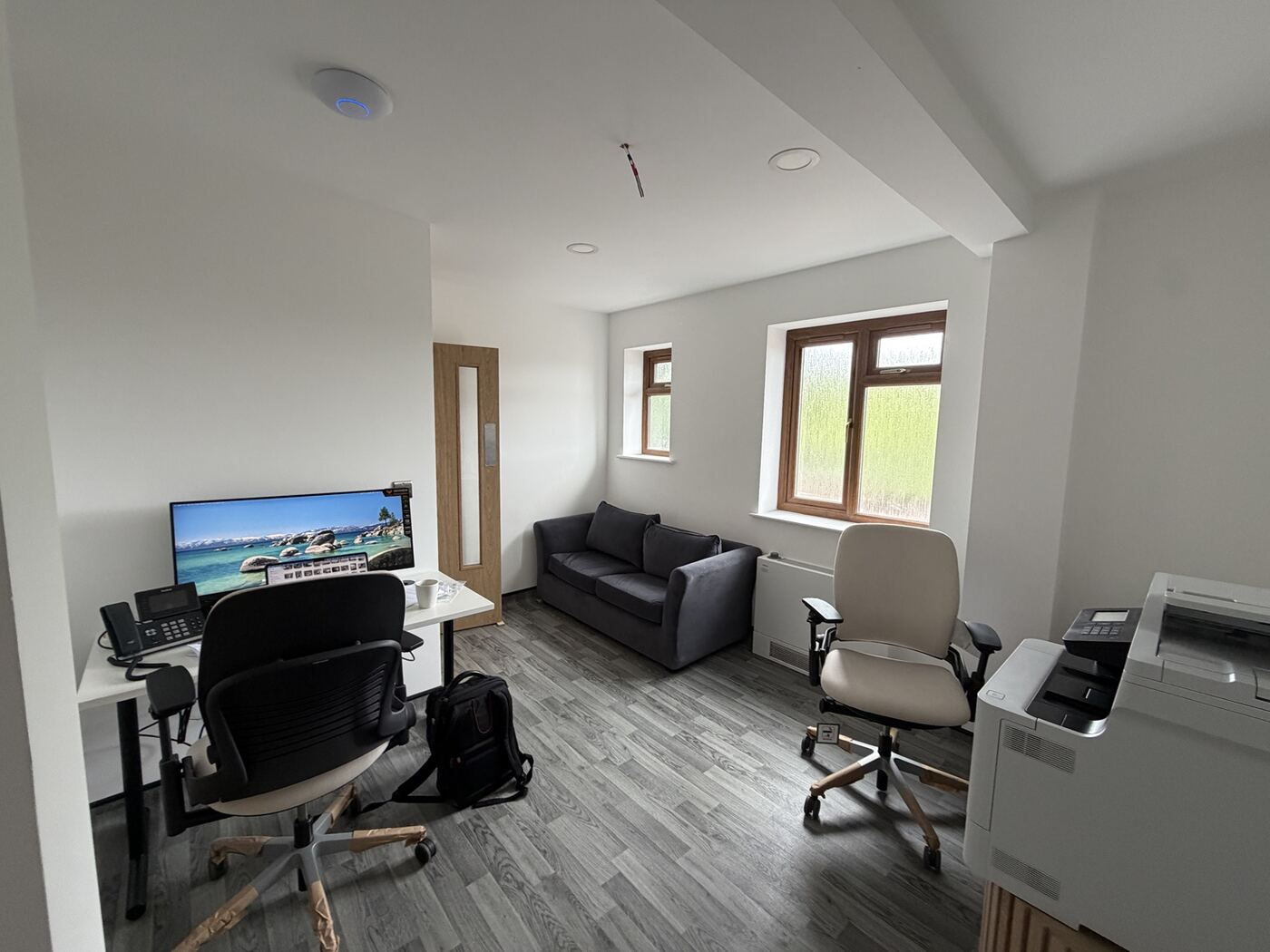 Staff office with sofa and desks