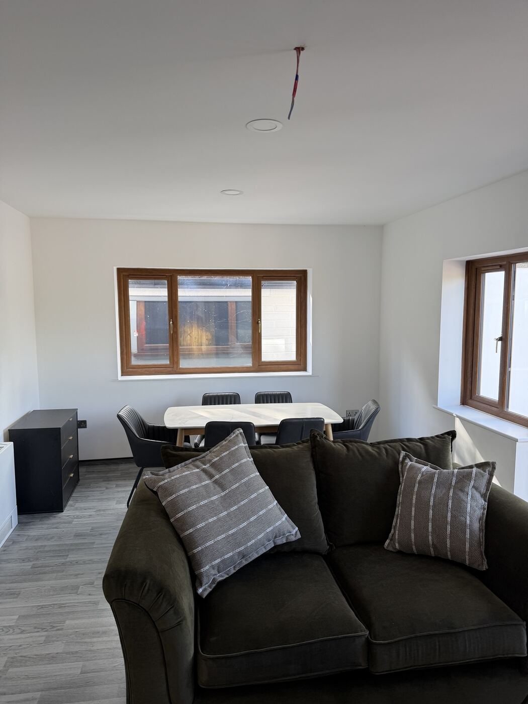 Living and dining area of one of the suites